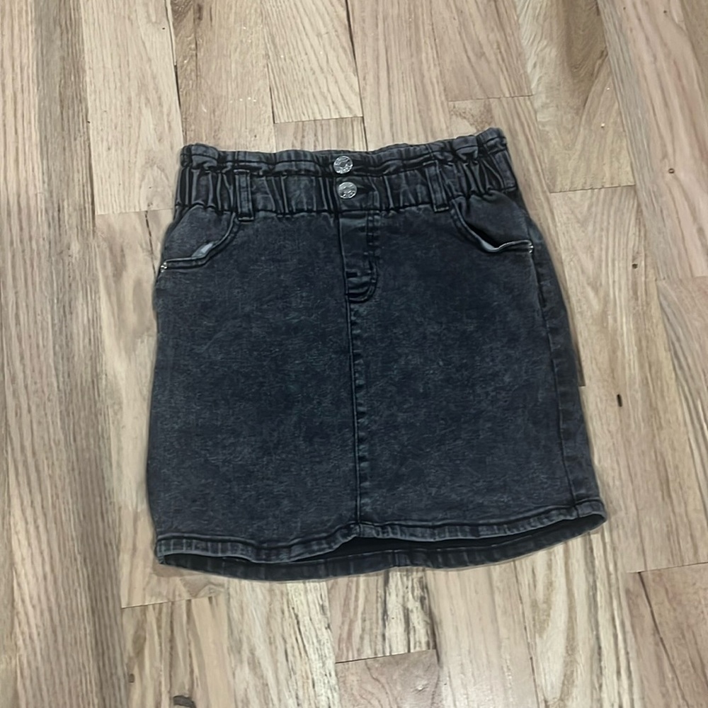 I’m selling this cute skirt which has shorts under it attached.